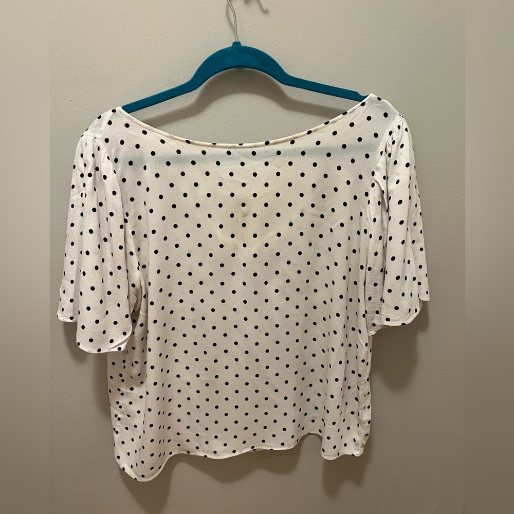 Polka dot top with loose flowy short sleeves